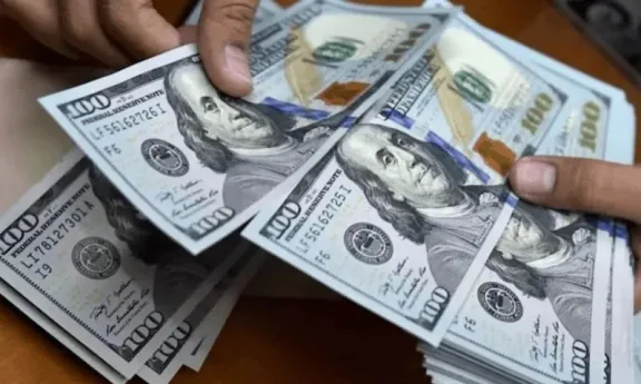 El dólar oficial rozó los $1